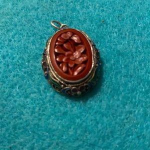 1920S SILVER AND BLUE ENAMEL CINNABAR PENDANT